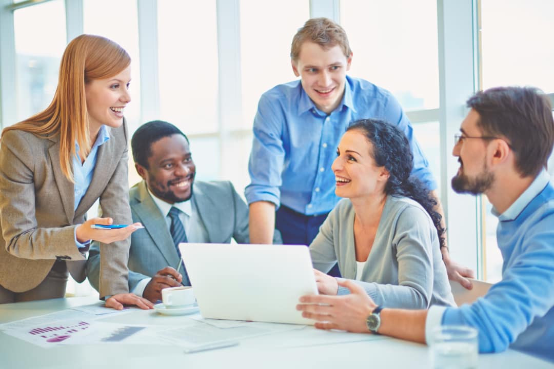 executives-joking-laughing-office (1)